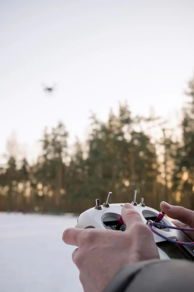 Licensed pilot operating drone equipment on site